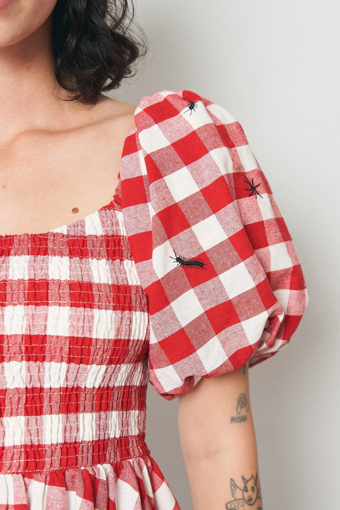 2 left - Bugs Smocked Picnic Mini Dress sold by Fashion Brand Company product image thumbnail 5