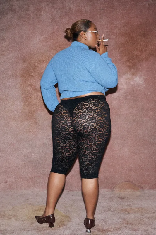 1 left- Black Rose Lace Capri Pants sold by Fashion Brand Company