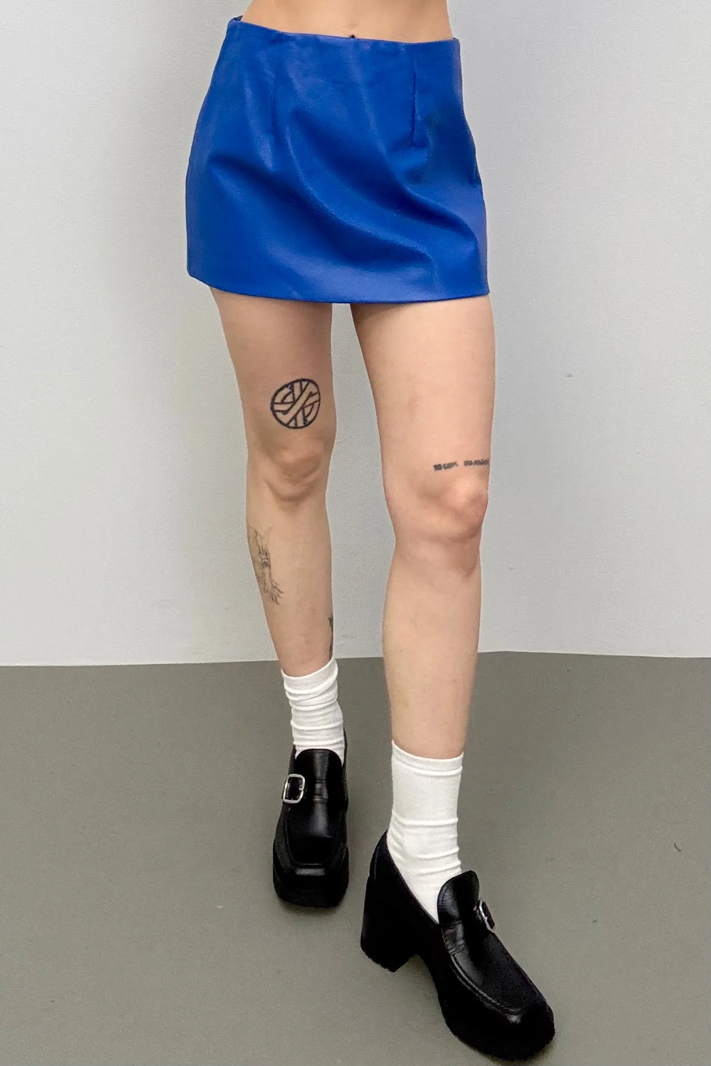 SAMPLE #267 - S Blue faux Leather Mini Skirt sold by Fashion Brand Company