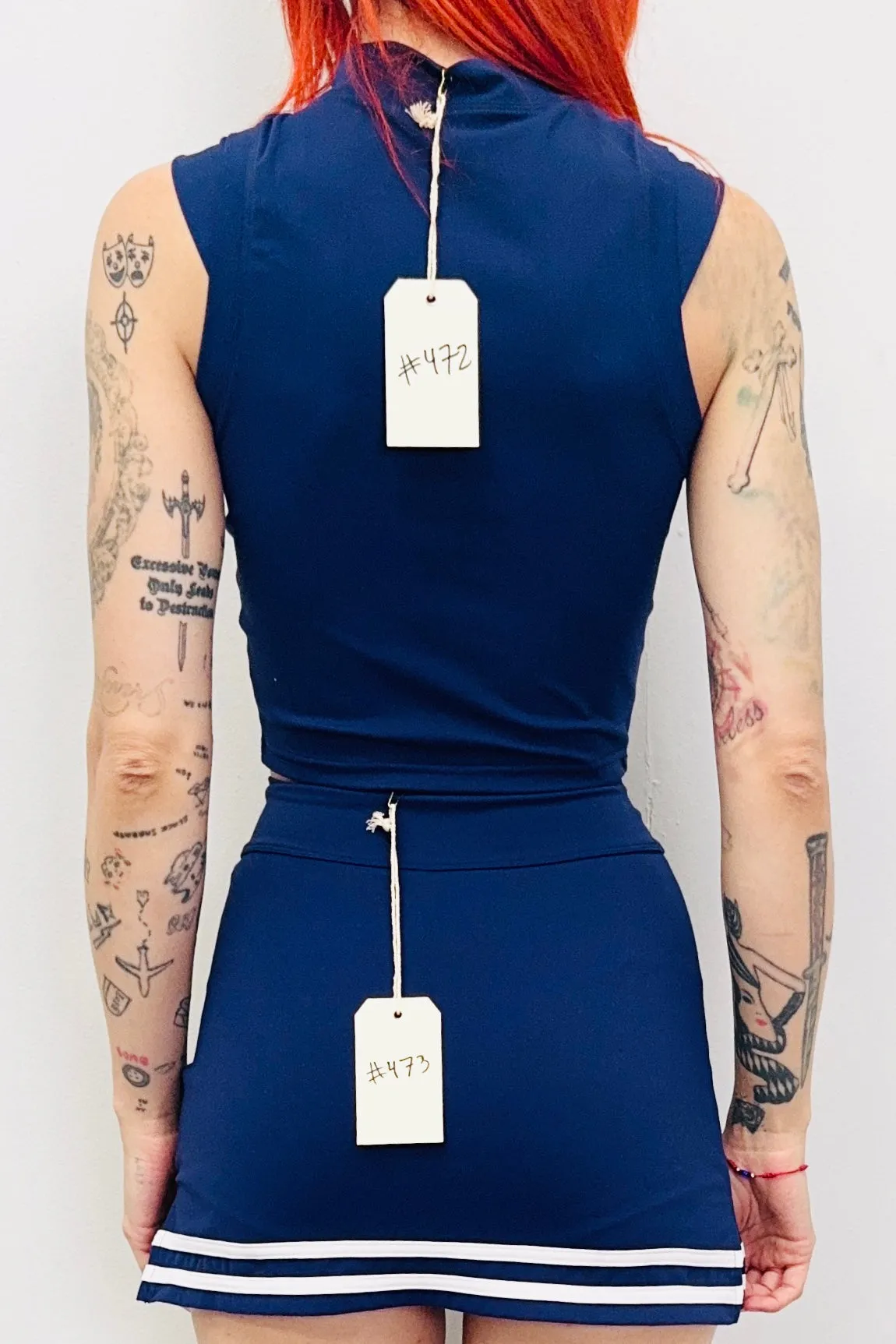 SAMPLE #473 - XS Navy Cheer Skort sold by Fashion Brand Company product image thumbnail 3