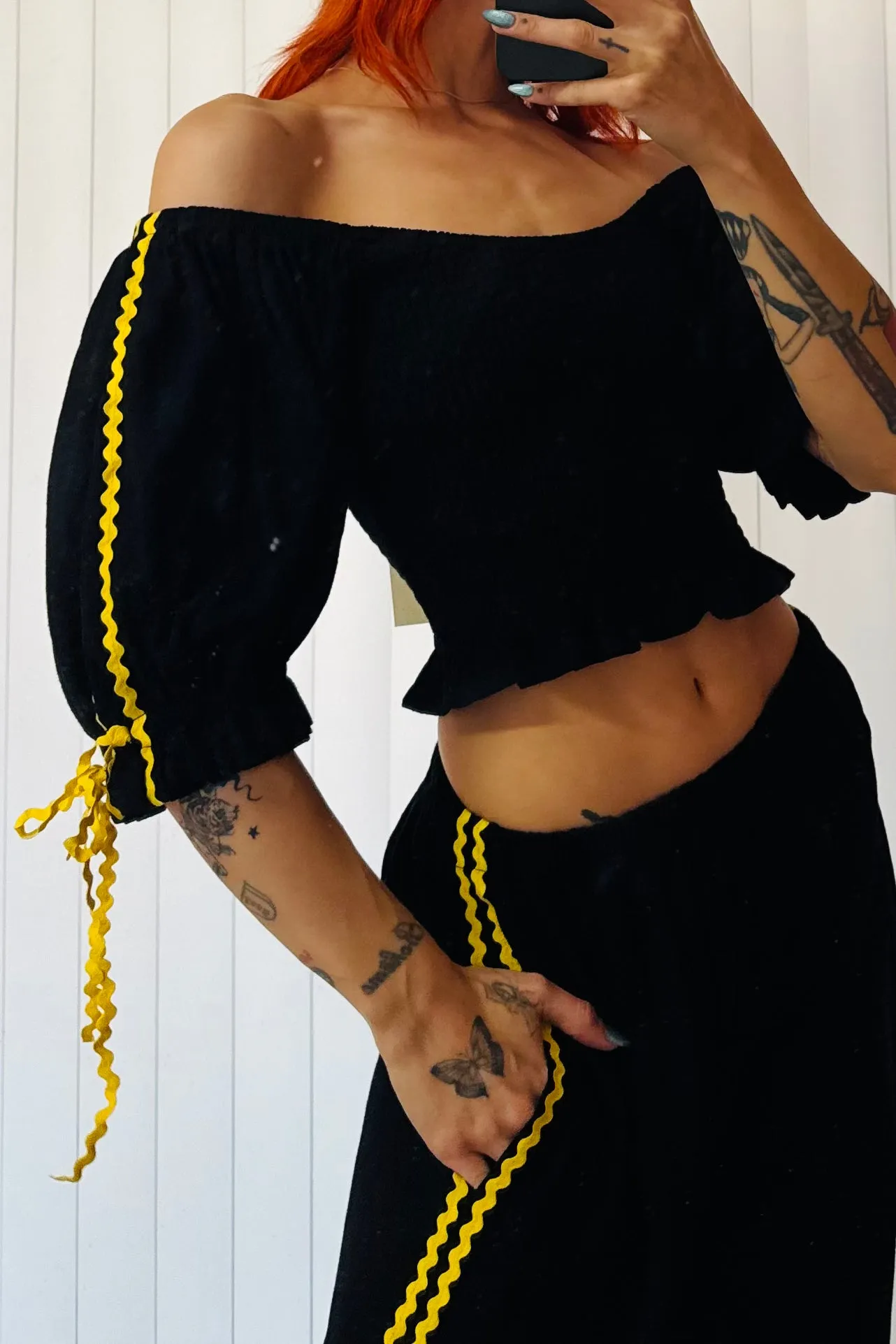 SAMPLE #665 - S Black Ric Rac Smocked Top sold by Fashion Brand Company