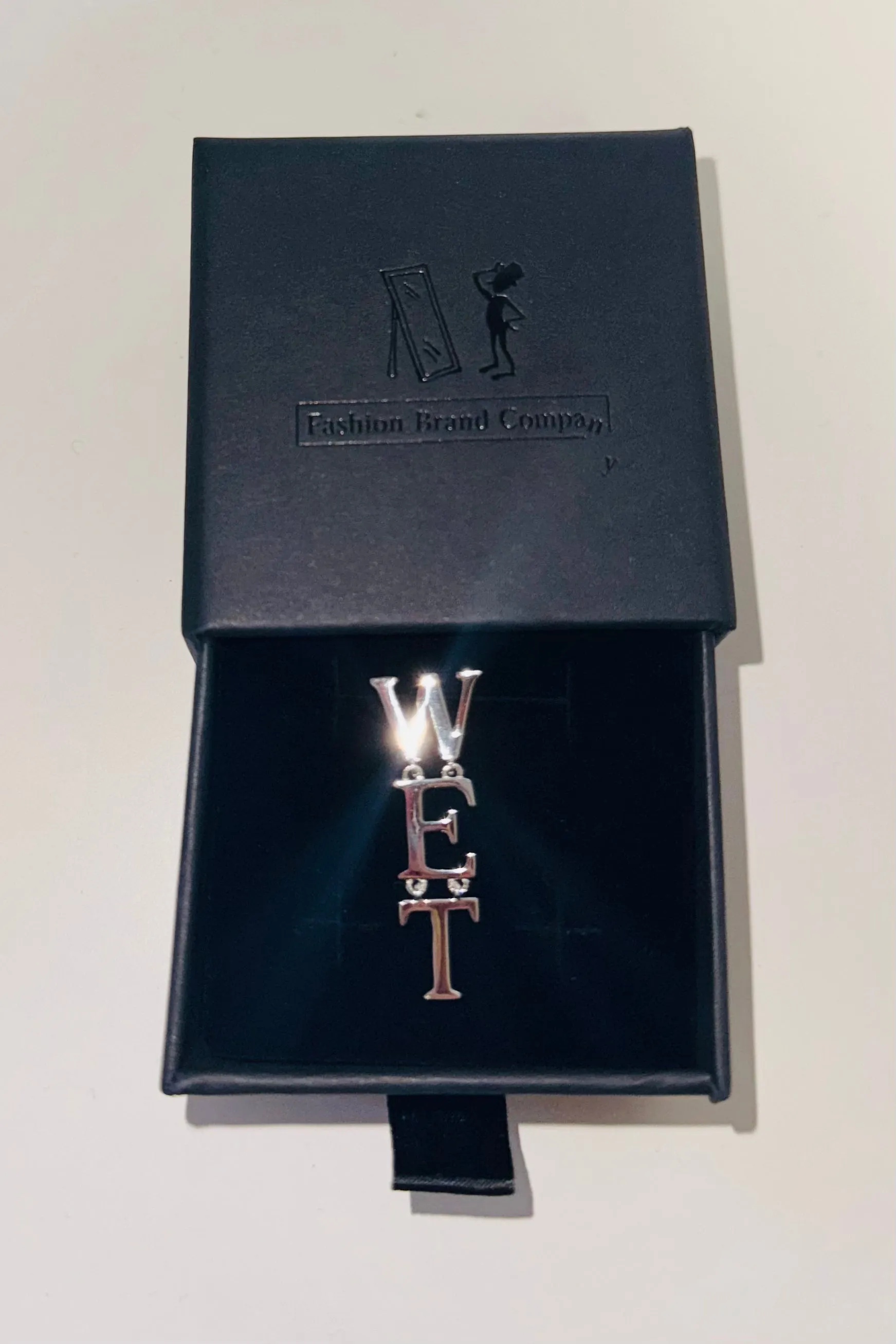 Sterling Silver WET Dangle Earring sold by Fashion Brand Company