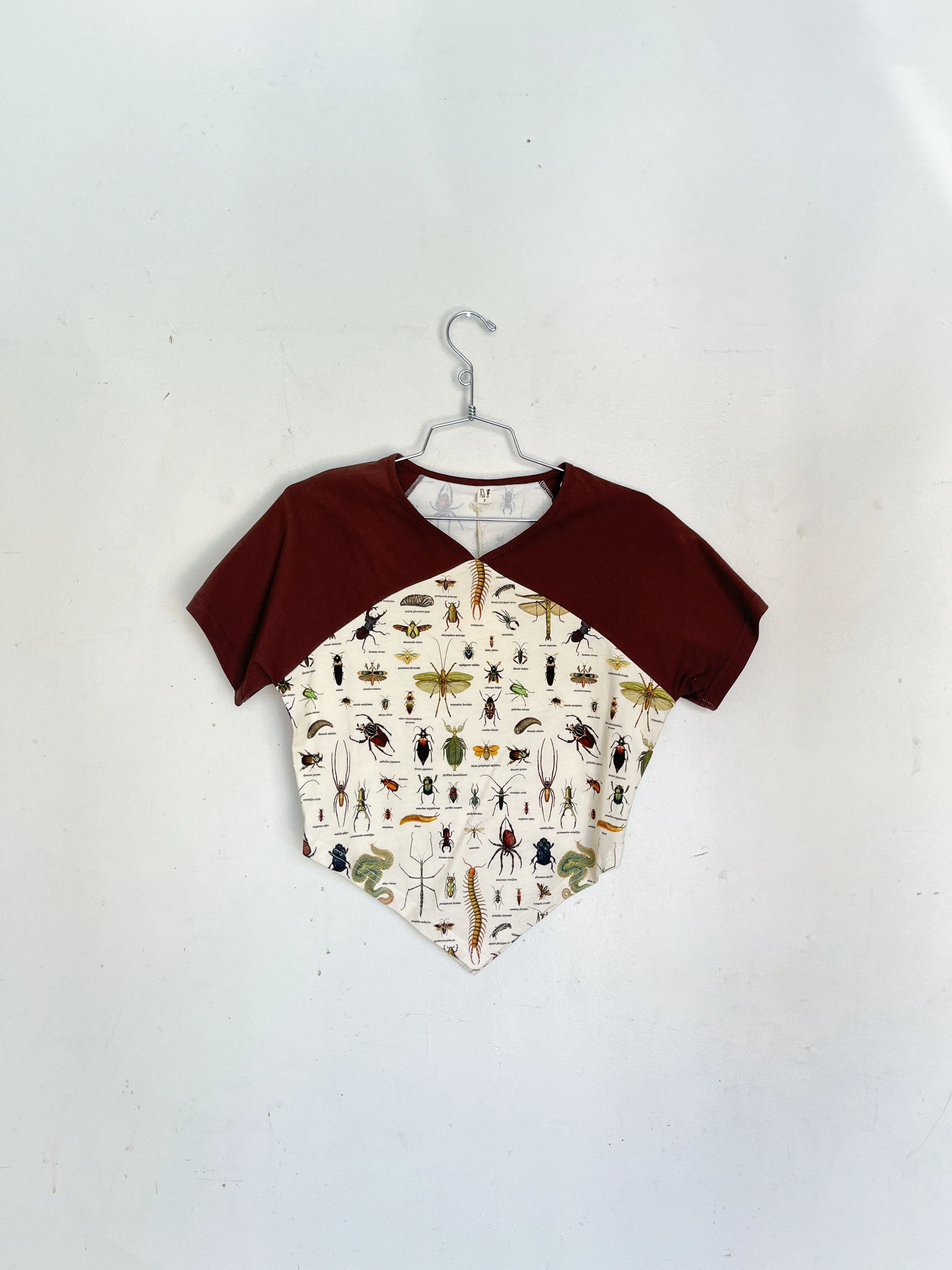#1: S Scrap Raglan Tee - Worst Bugs / Brown sold by Fashion Brand Company