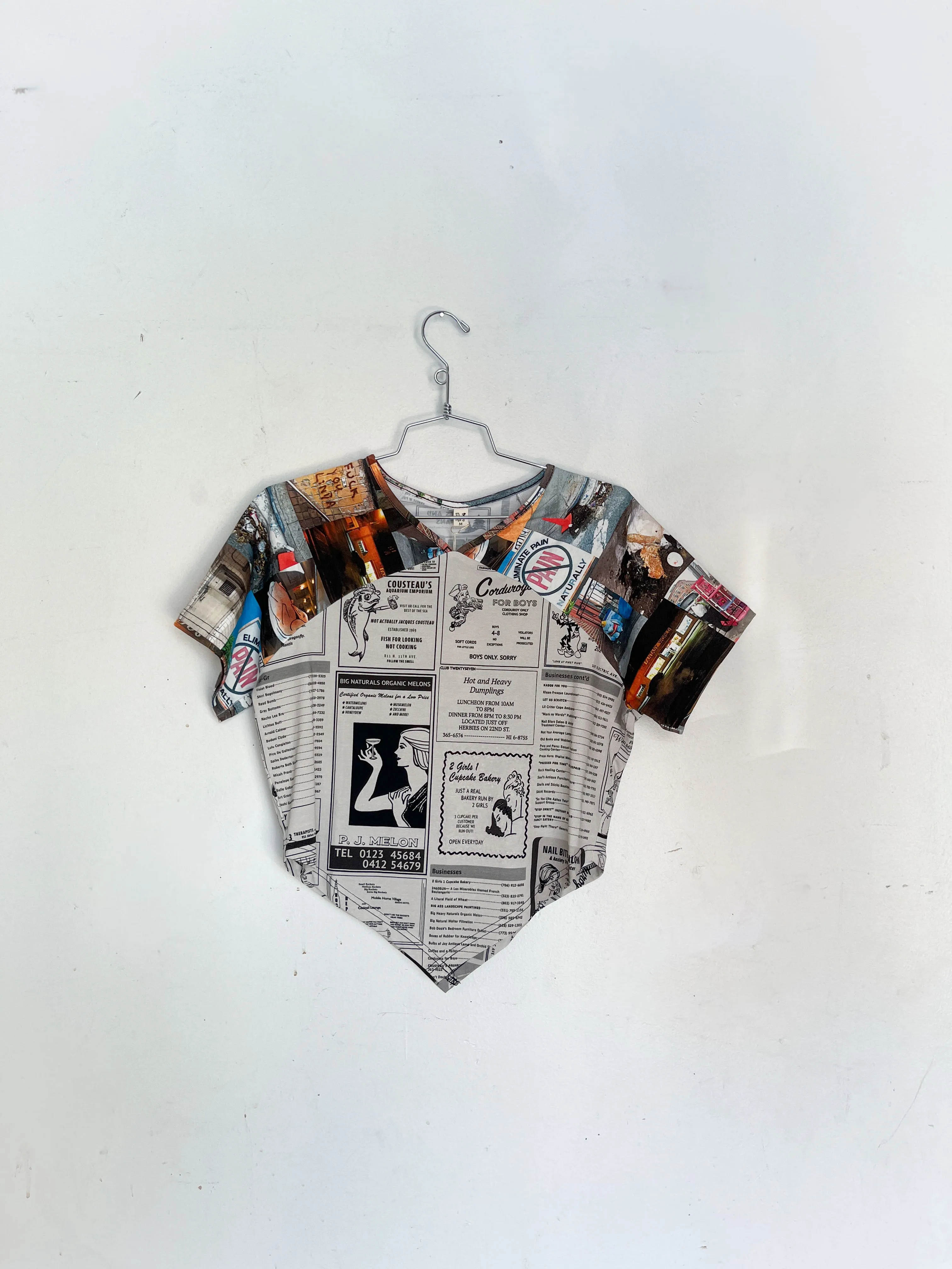 #28: L Scrap Raglan Tee - White Pages / Nyc Trash sold by Fashion Brand Company