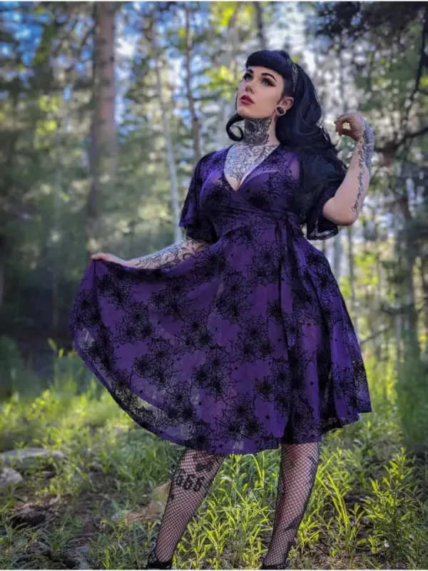 Aurora Wrap dress in Flocked Spiderweb Violet Mesh sold by Wax Poetic