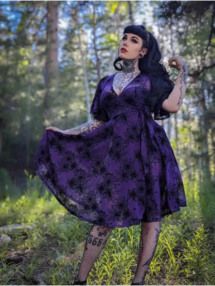 Aurora Wrap dress in Flocked Spiderweb Violet Mesh sold by Wax Poetic