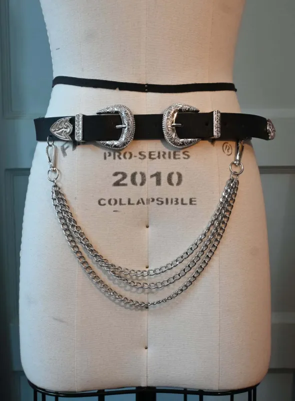 Black Western-style faux leather belt with Silver layered chains sold by Wax Poetic
