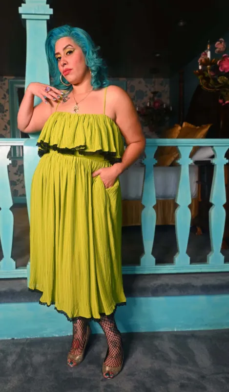 Olivia dress in Uranium Green sold by Wax Poetic