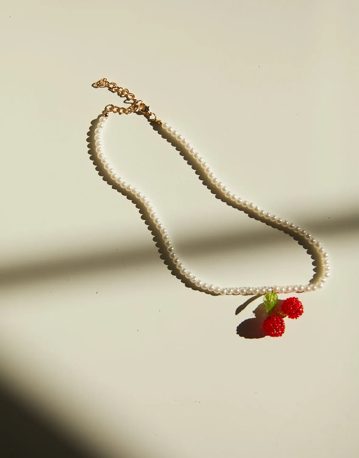 Faux Pearl and Cherry Necklace sold by 2020 Ave product image thumbnail 2