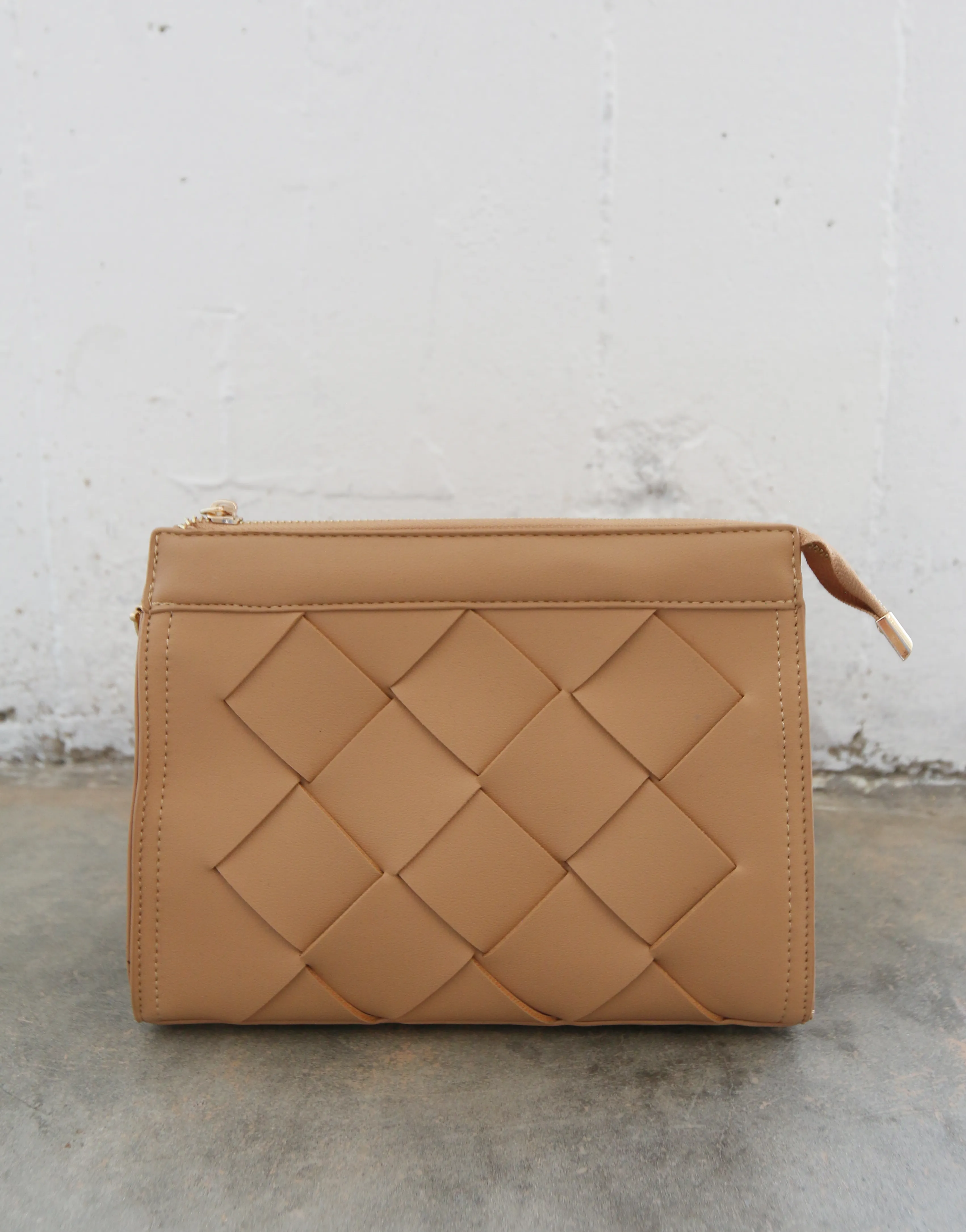 On The Go Woven Clutch sold by 2020 Ave