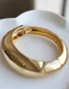 Wave Bangle sold by 2020 Ave