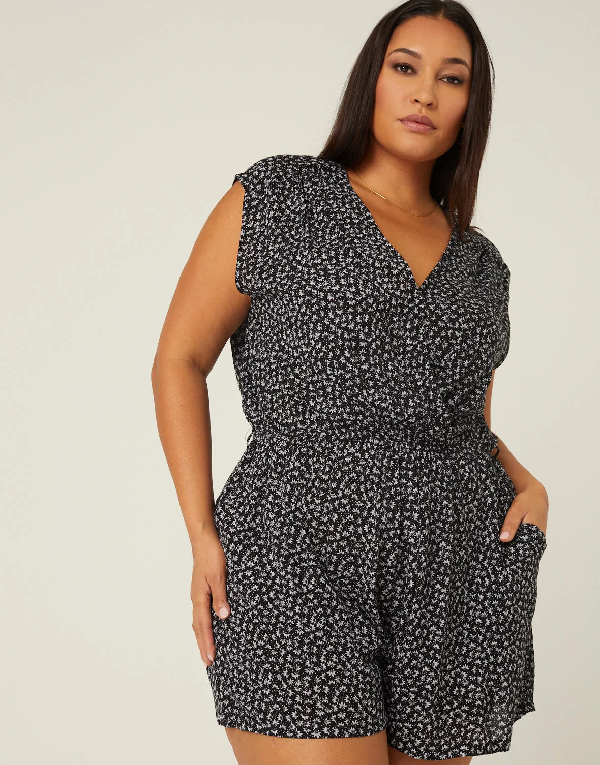 Plus Size Sleeveless Floral Surplice Romper sold by 2020 Ave