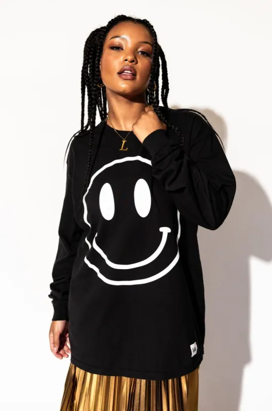 The World Needs Your Magic Groovy Oversized Long Sleeve Tee in Black + White sold by Dressed In Lala