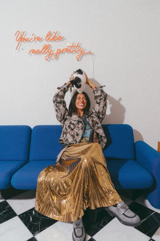 Metallic Pleated Midi Skirt in 24 Karat Gold sold by Dressed In Lala