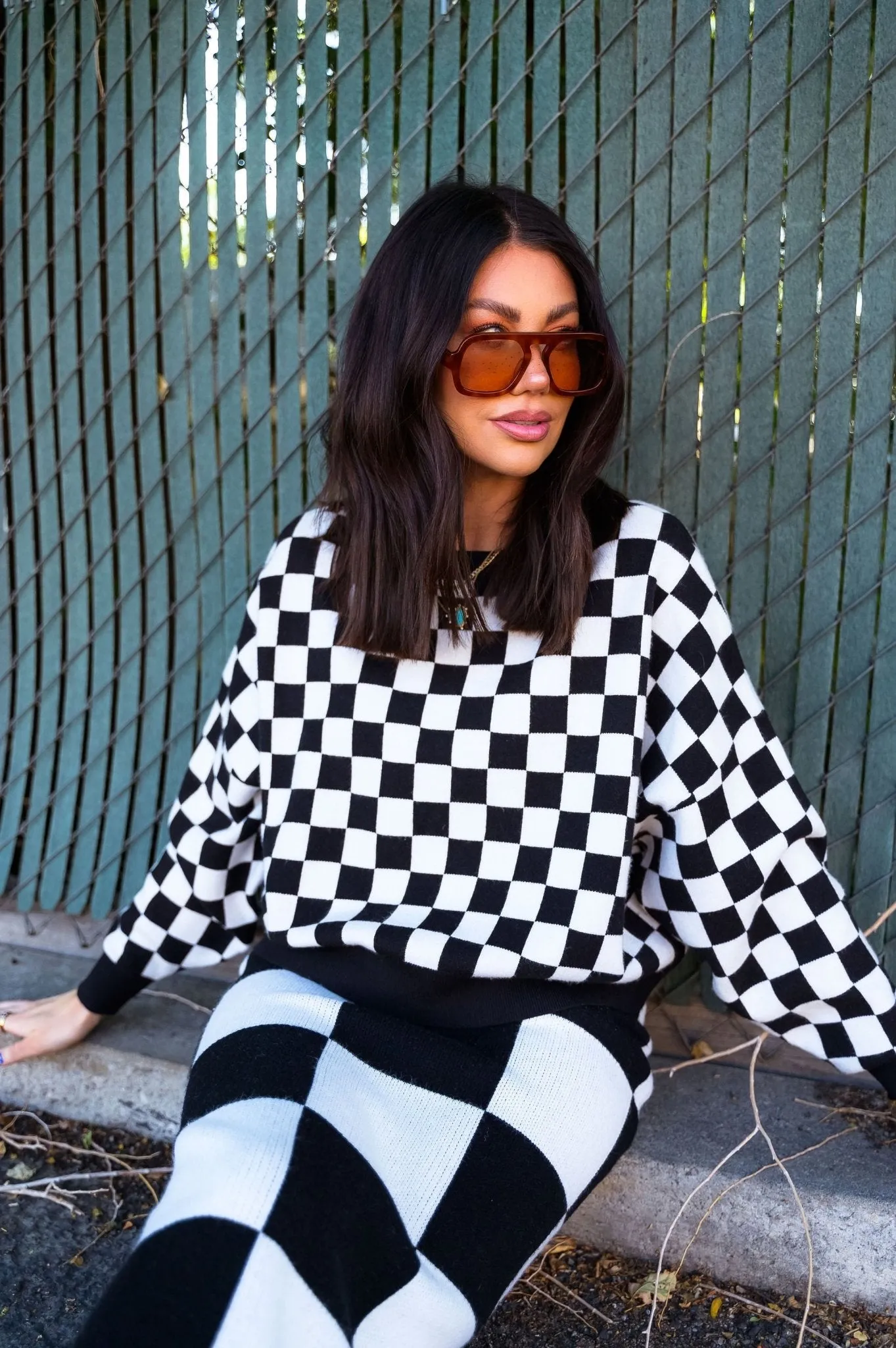 Retrograde Boxy Mod Knit in Checkerboard sold by Dressed In Lala