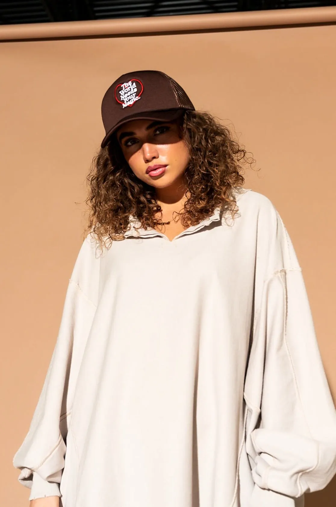 The World Needs Your Magic Trucker Hat in Mocha sold by Dressed In Lala product image thumbnail 4