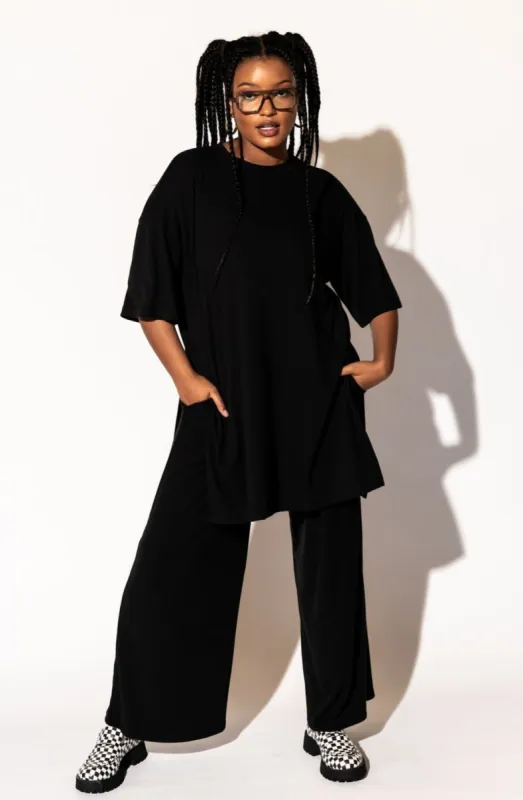 Leveled Up Ribbed Playsuit in Black sold by Dressed In Lala