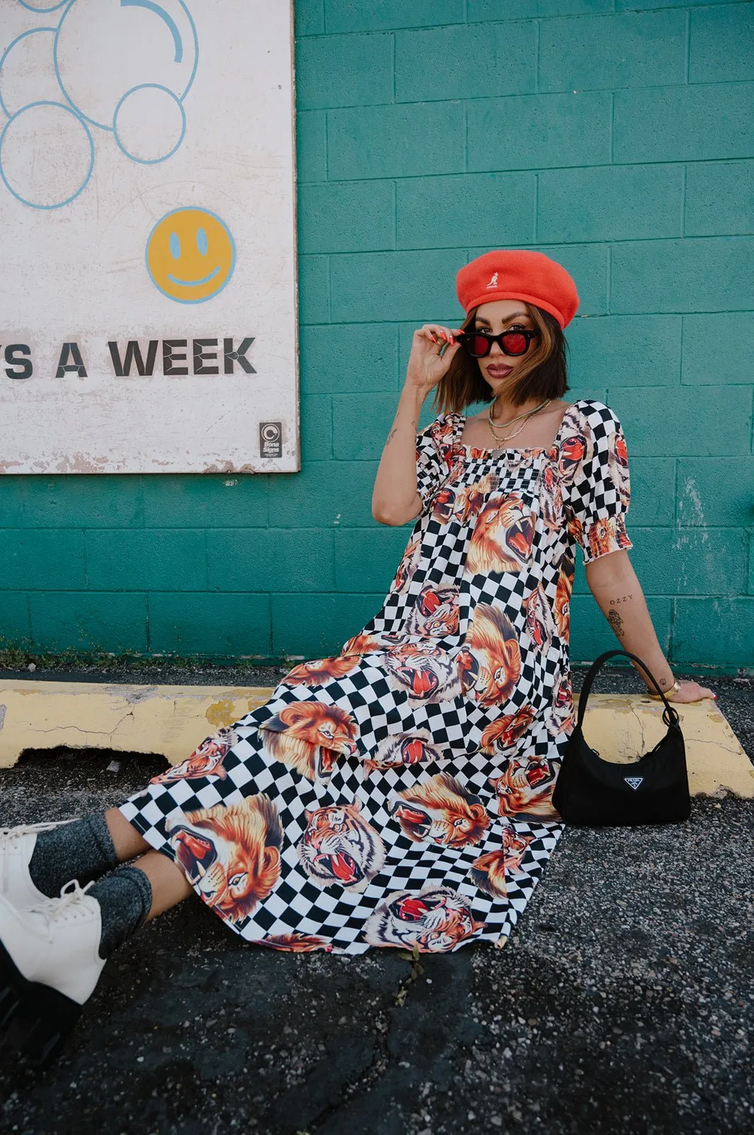 Palm Springs Smocked Dress in Lions, Tigers, Check, Oh My! sold by Dressed In Lala