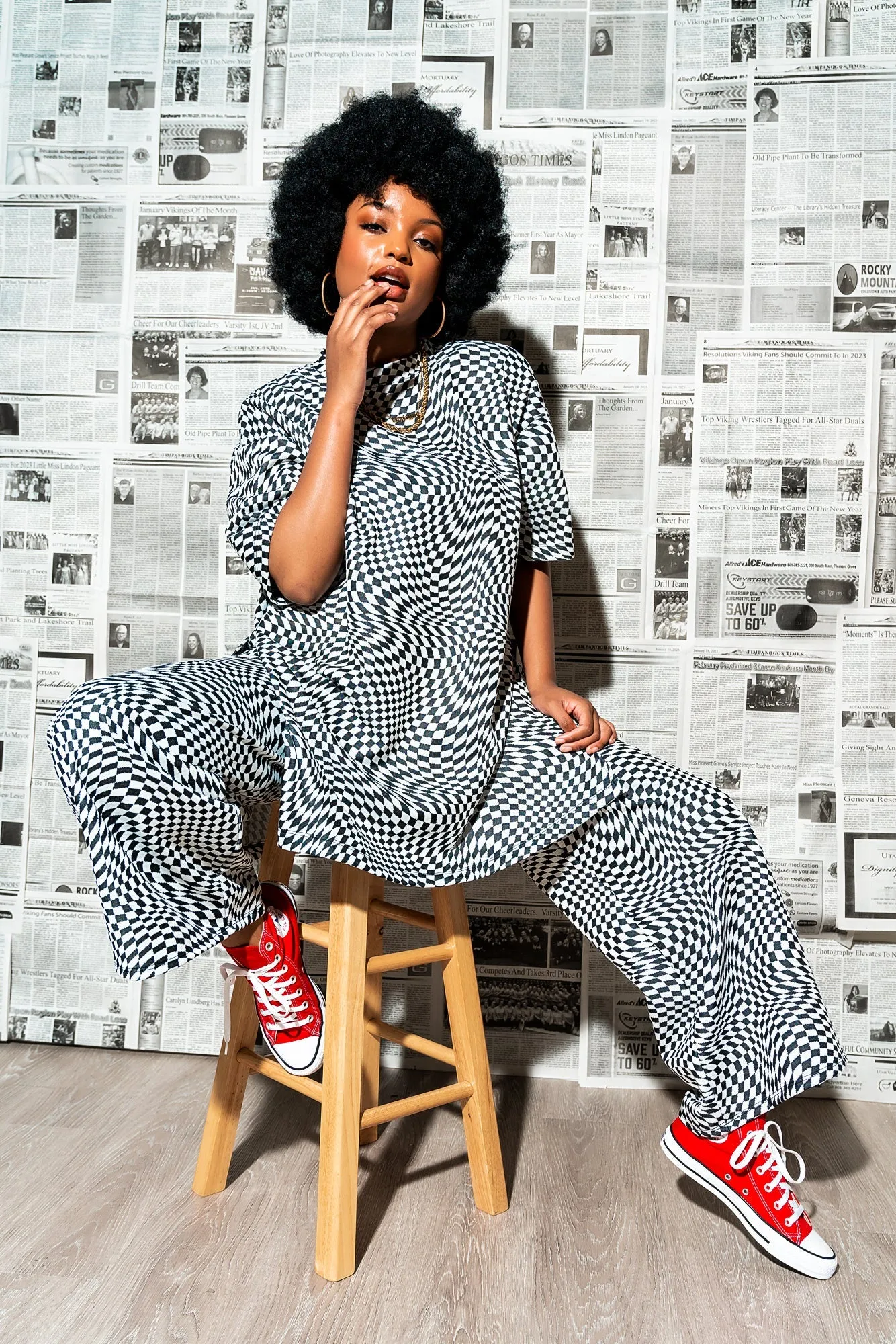 Leveled Up Double Knit Playsuit in Groovy Black Checker sold by Dressed In Lala