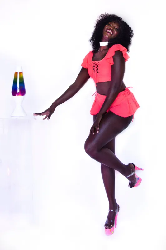 Naomi bottom in neon coral sold by Alpine Butterfly