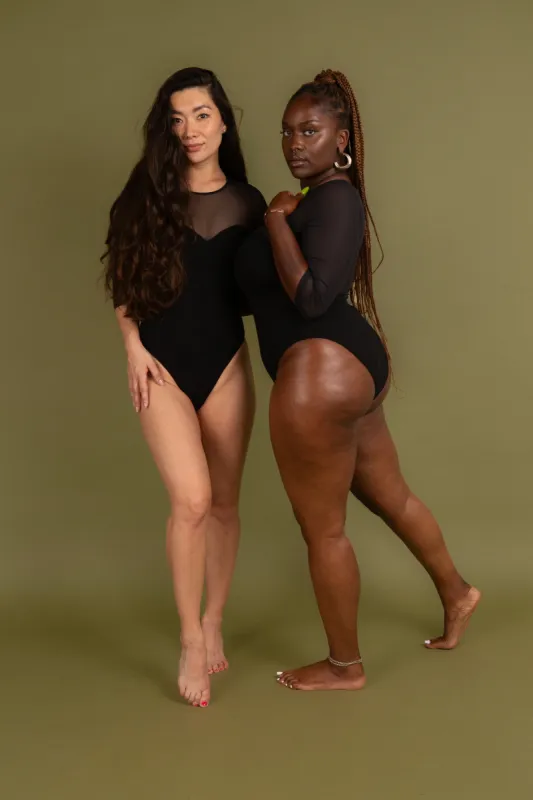 Kupu Bodysuit  3/4 Sleeved and Mesh in Black sold by Manners London