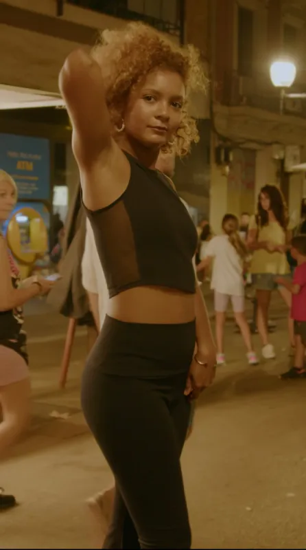 Mesh Iza Crop Top in Black sold by Manners London