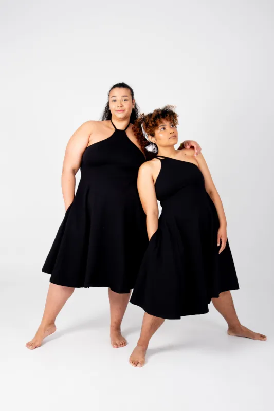 Asri Point Neck Midi Dress in Black sold by Manners London