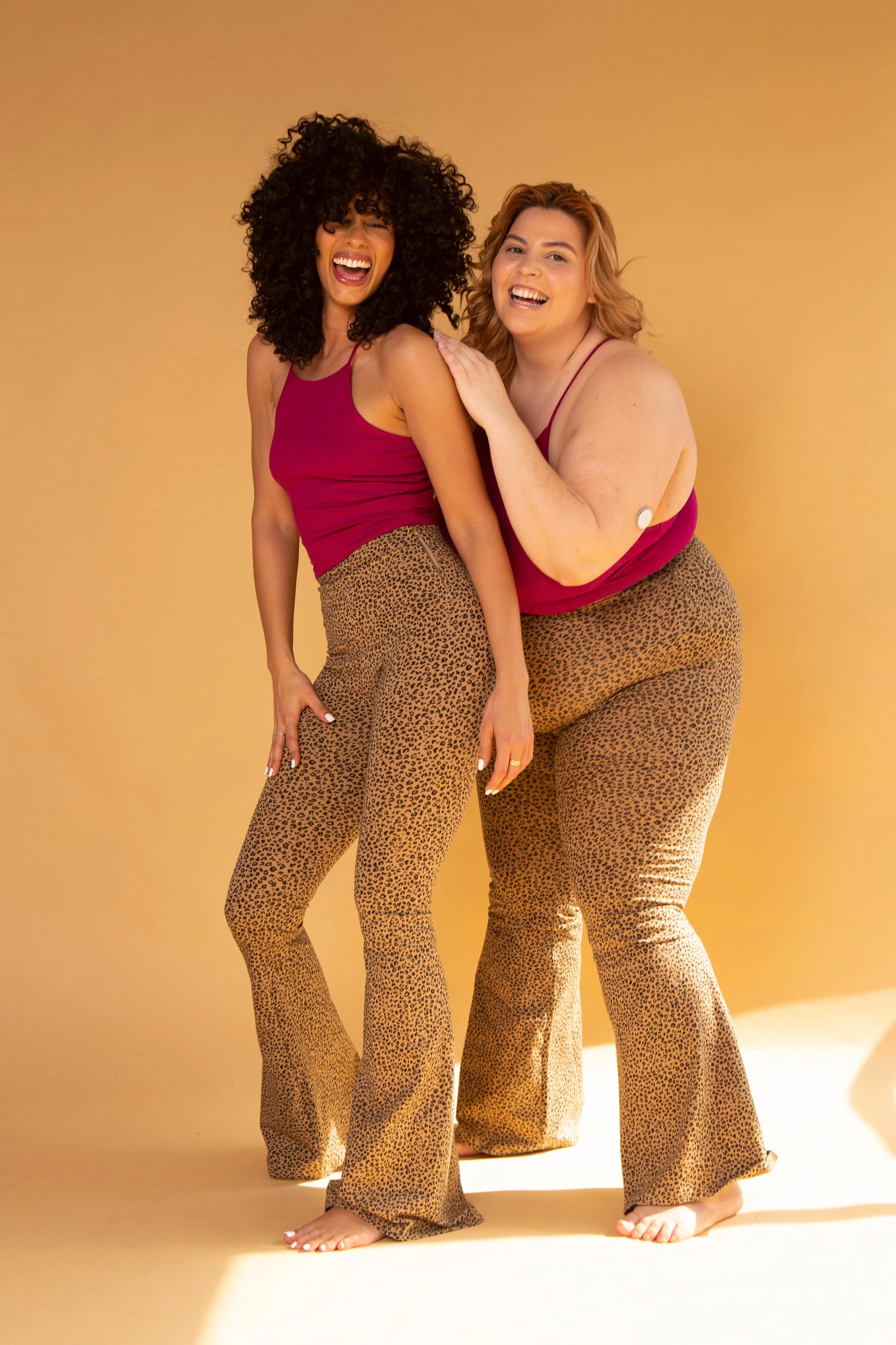 Faiza Flare Trousers Petite in Classic Leopard sold by Manners London