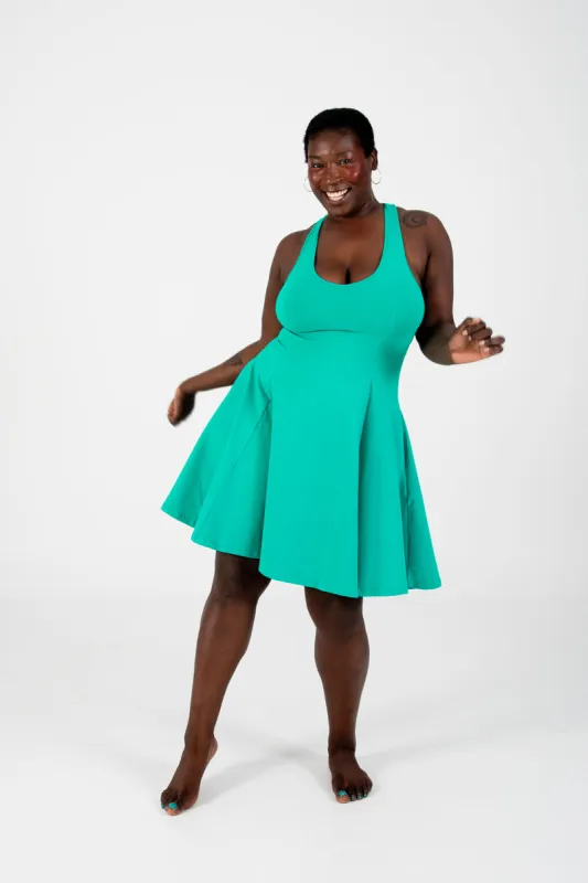 Asri Cross Back Mini Dress In Teal sold by Manners London