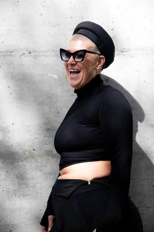 Turtle Neck Long Sleeve Crop Top with Hole in Black sold by Manners London