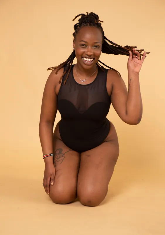 Kupu Sleeveless Bodysuit in Black and Mesh made by Manners London
