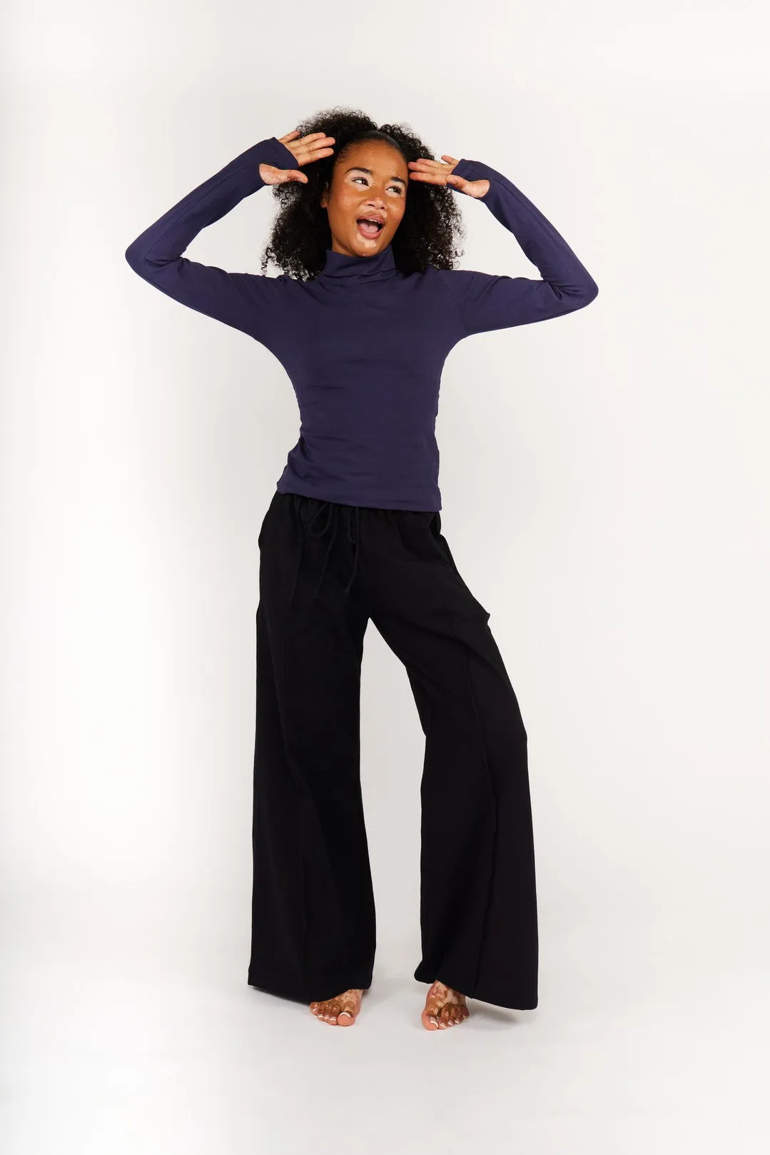 Turtle Neck Long Sleeve Full Length Top with Hole in Eclipse sold by Manners London