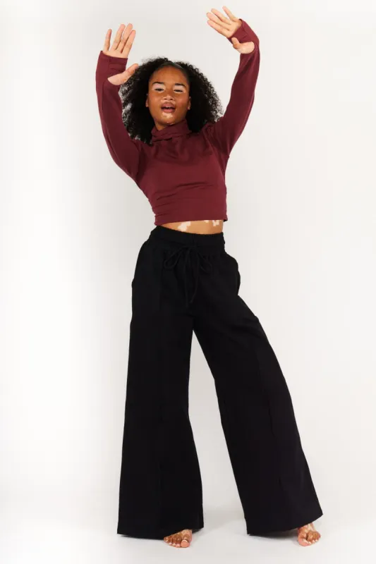 Turtle Neck Long Sleeve Crop Top with Hole in Tawny Port sold by Manners London