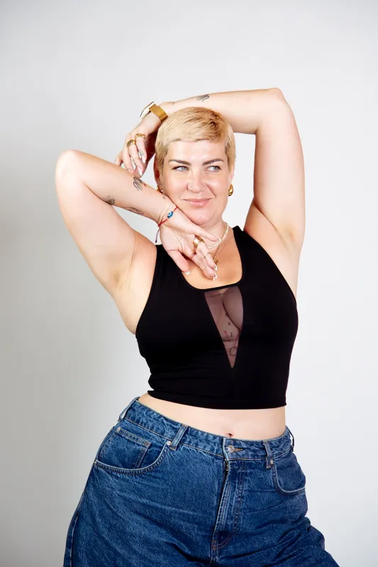 Mesh V-Neck Crop Top sleeveless in Black sold by Manners London