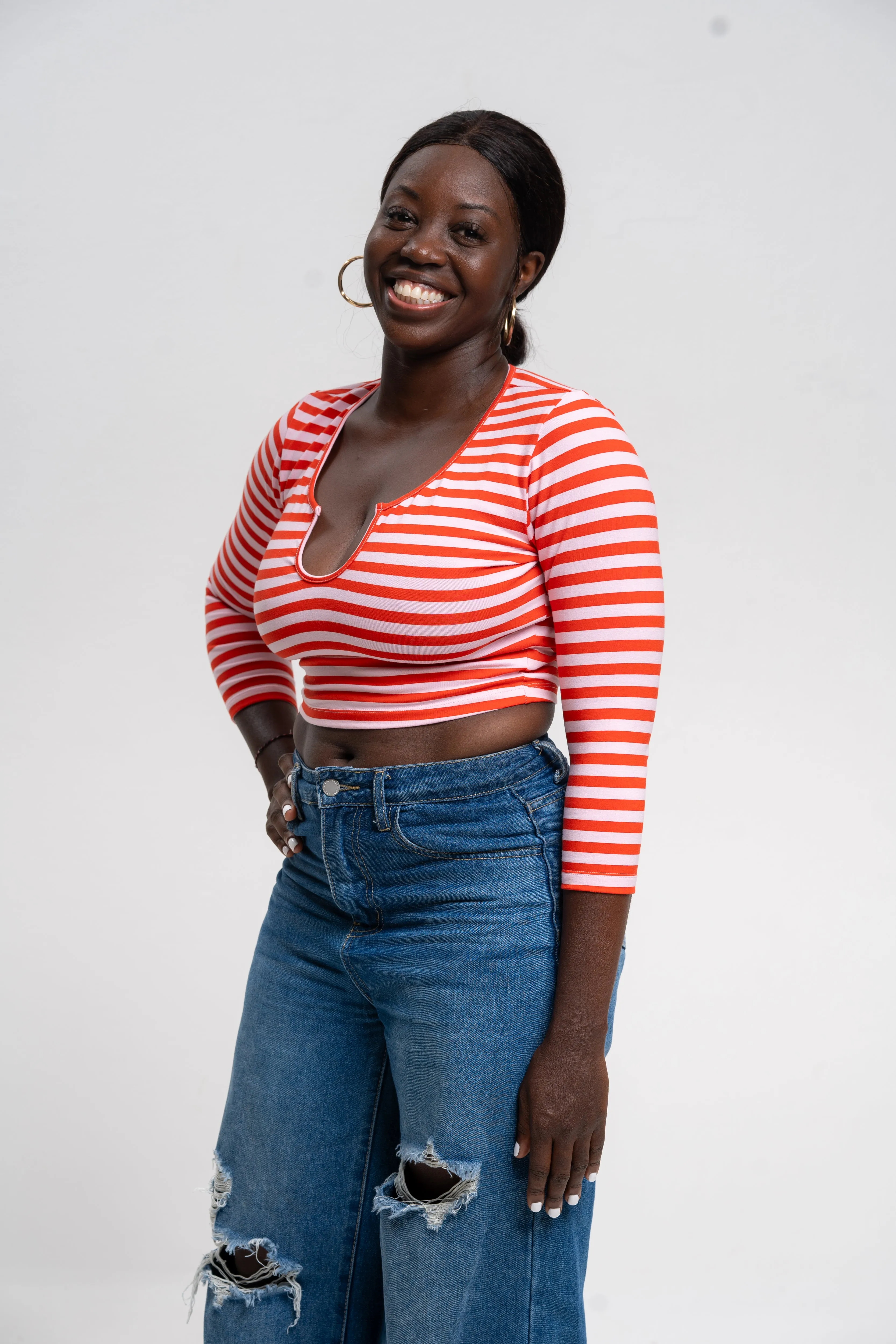 U Front Crop Top (7/8 sleeves) In Tomato Red on Bubblegum Pink! sold by Manners London