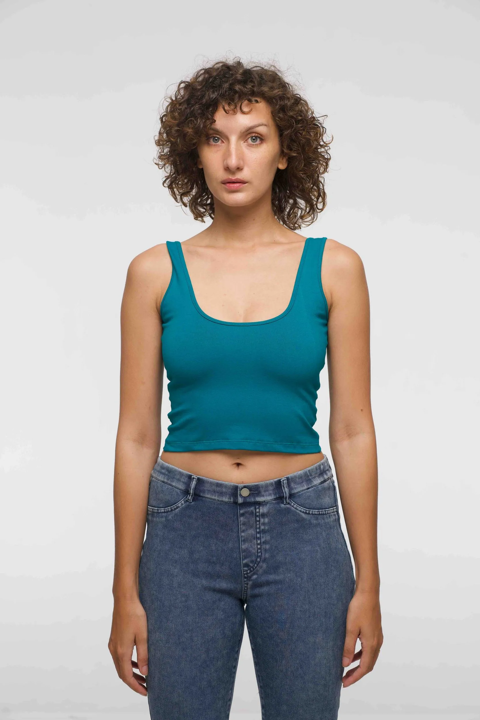 Api Mid Crop Top in Deep Turquoise sold by Manners London