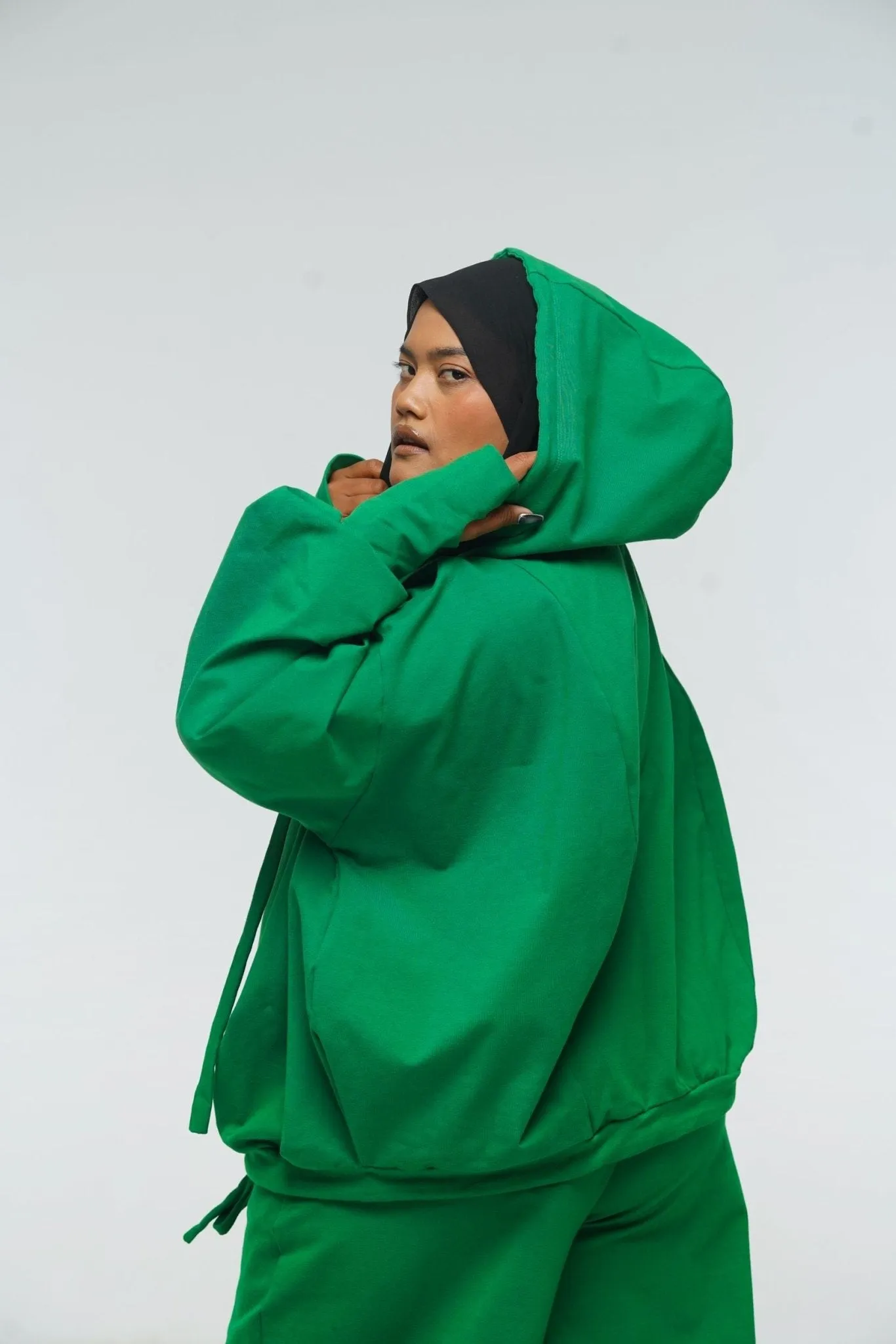 Oversized Balloon Hoodie with Zip in Grass Green sold by Manners London