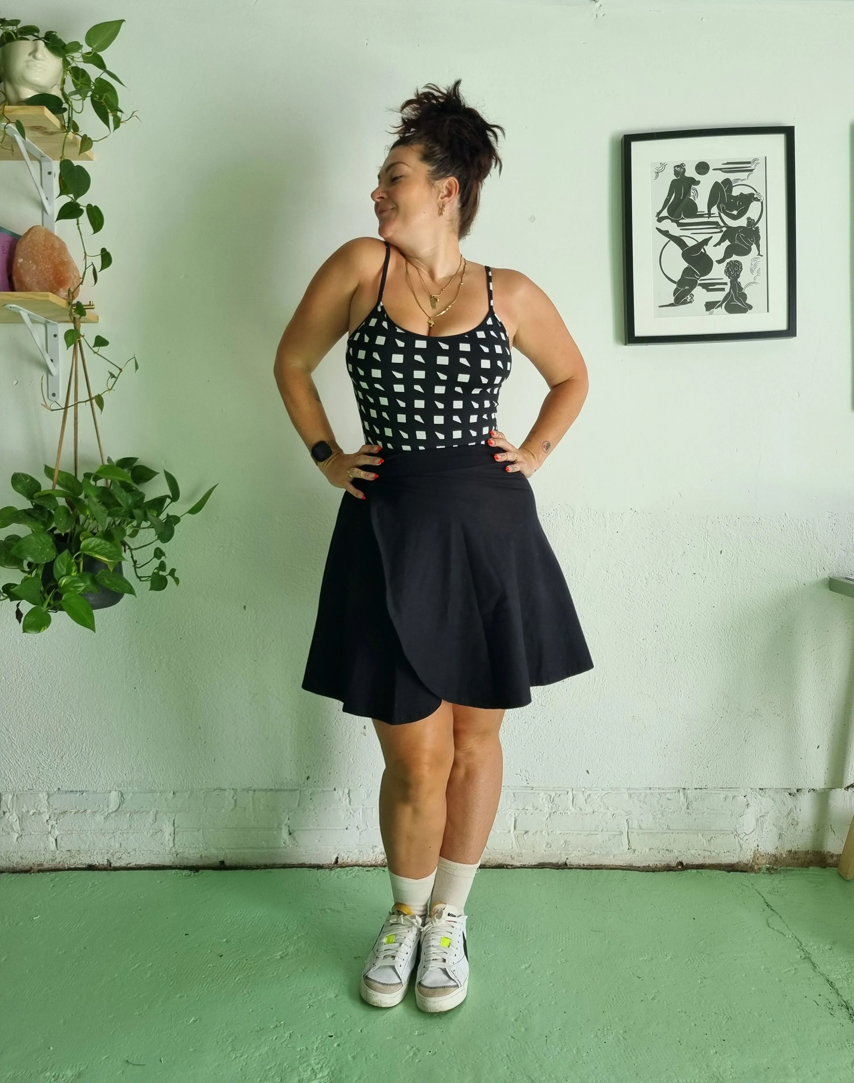 Wrap Mini Skirt in Black sold by Manners London