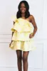 Dolly Tiered One Shoulder Ruffle Dress: Pastel Yellow sold by Bella and Bloom