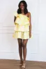 Dolly Tiered One Shoulder Ruffle Dress: Pastel Yellow sold by Bella and Bloom