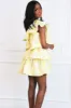 Dolly Tiered One Shoulder Ruffle Dress: Pastel Yellow sold by Bella and Bloom