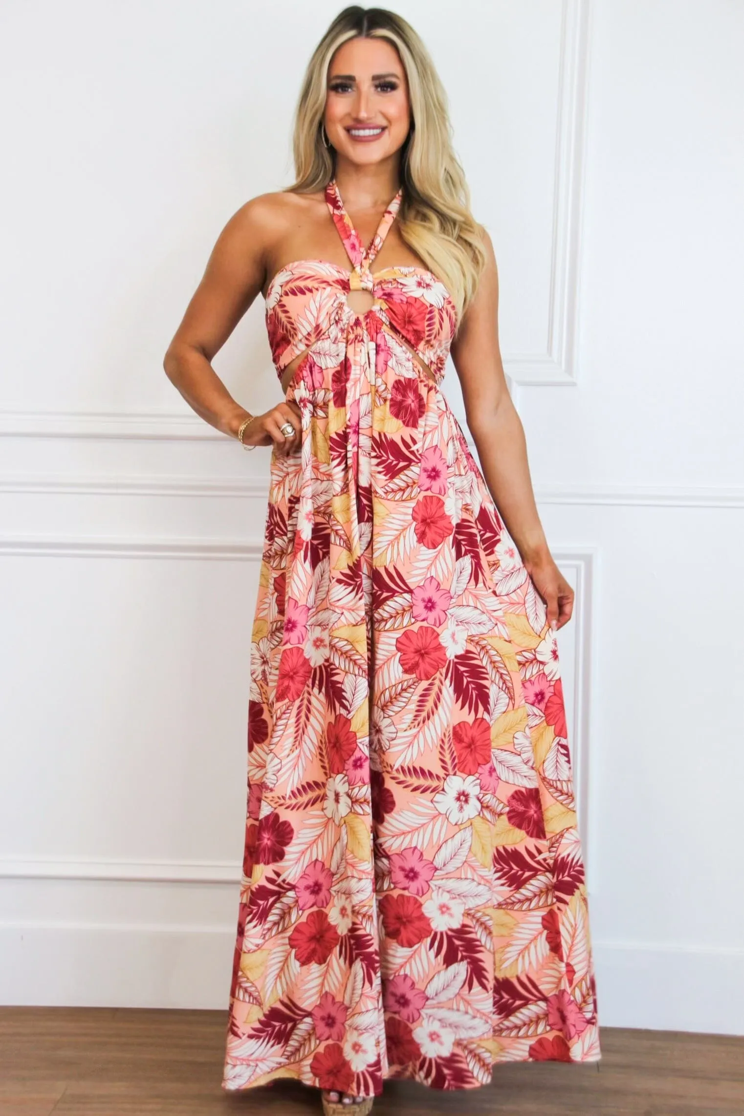 On Vacay Time Halter Cutout Floral Maxi Dress: Peach/Red Multi sold by Bella and Bloom