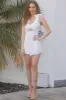 Summer's Calling Romper: White sold by Bella and Bloom