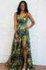 Holiday Affair Sparkly Open Back Maxi Dress: Emerald sold by Bella and Bloom
