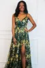 Holiday Affair Sparkly Open Back Maxi Dress: Emerald sold by Bella and Bloom