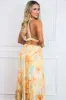 Celestina Floral Watercolor Open Back Maxi Dress: Yellow Multi sold by Bella and Bloom