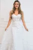 Sealed With A Kiss Bustier Cape Wedding Dress sold by Bella and Bloom