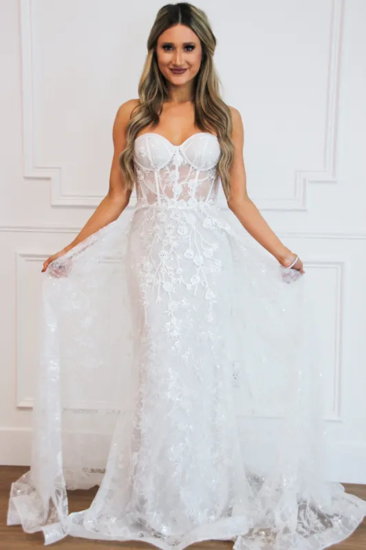 Sealed With A Kiss Bustier Cape Wedding Dress sold by Bella and Bloom