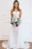 Sealed With A Kiss Bustier Cape Wedding Dress sold by Bella and Bloom