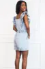 Warren Denim Ruffle Romper: Medium Wash sold by Bella and Bloom